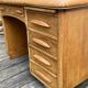 Antique light oak desk from the 1950s with 4 drawers