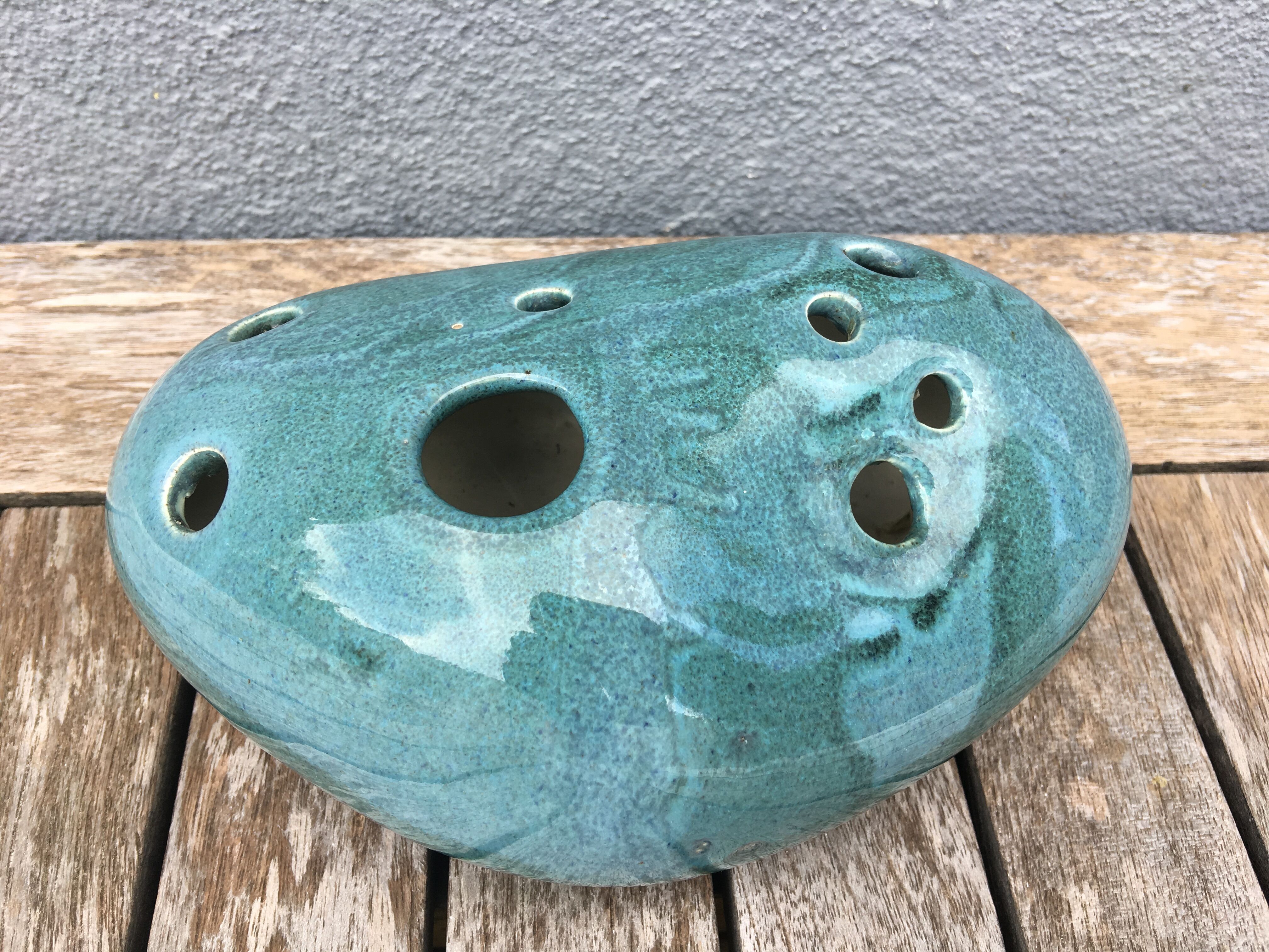 Roller spike flowers, blue-green ceramics