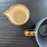 Cup and creamer set