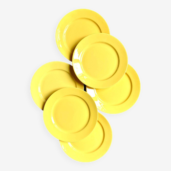 6 yellow earthenware dinner plates