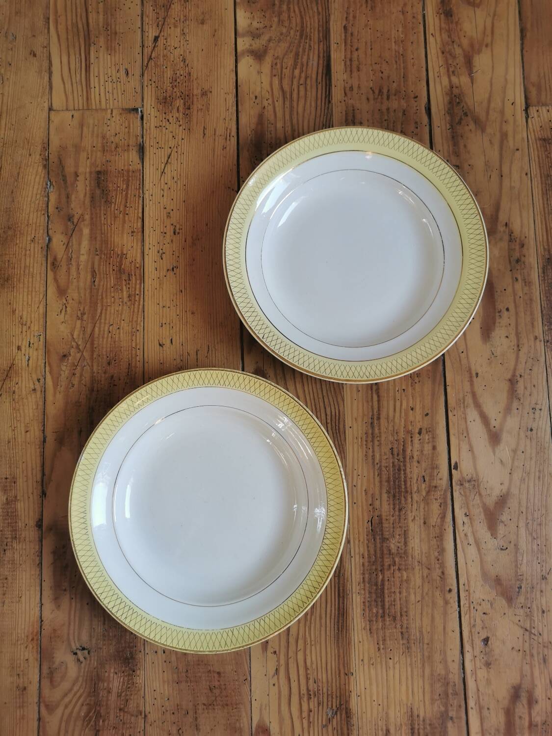 Vintage mismatched yellow and gold soup plates