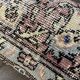 Coussin en tapis antique tissé à la main