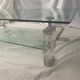Coffee table made of glass and plexiglass.