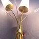 Pair of mid-century modern opaline brass wall lights, Maison Lunel, France, 1950