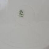 6 flat plates decorated with barbs