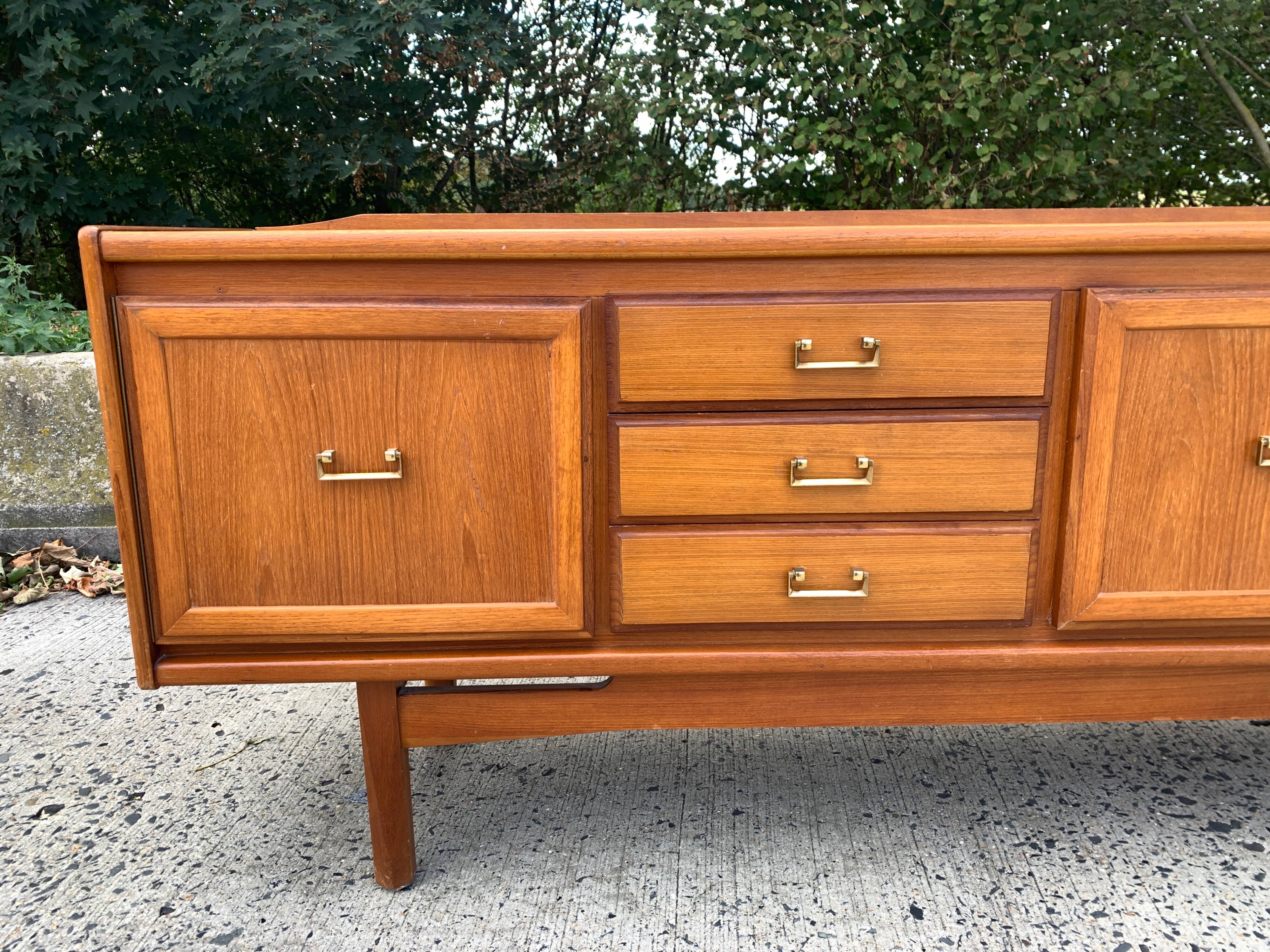 Teak enfilade from the 1970s by the English brand William Laurence.