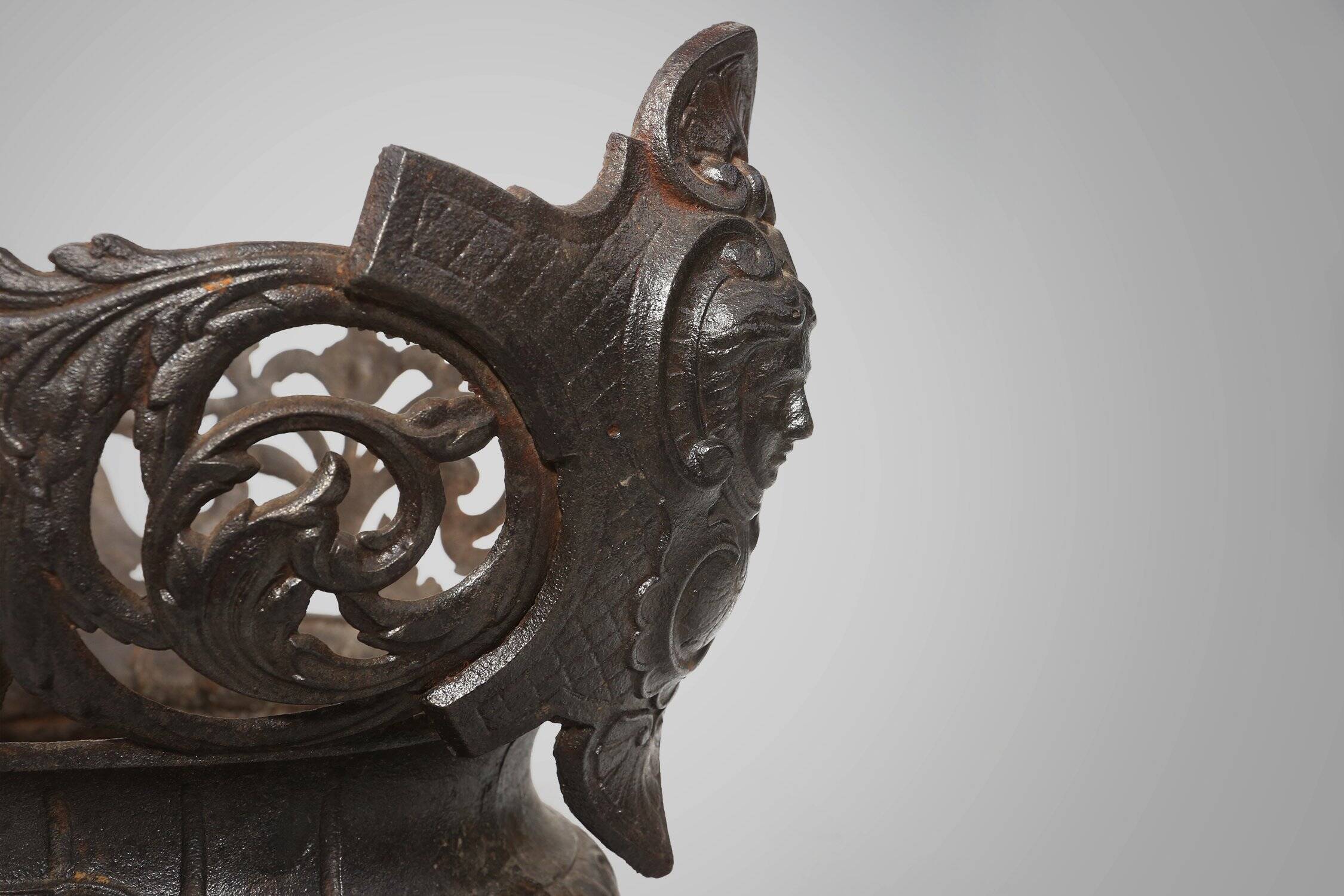 Cast Iron planter decorated with masks and lion paws, France 1850s