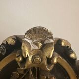 Napoleon III mirror with a pediment featuring black and gold dragons and birds.