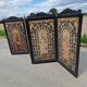 Folding screen in black-painted wood, 19th century
