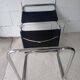 Paire de chaises en cuir noir et chrome modele Spoletto du designer Bersanelli