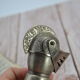 Old silver metal pouring cap