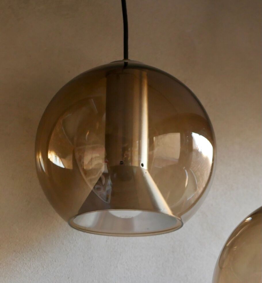 Pair of raak Amsterdam globe suspensions