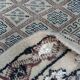Traditional handmade Berber carpet in brown and beige wool.