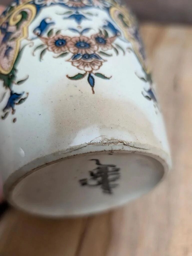 Antique ironstone cup from Sarreguemines with polychrome decoration.