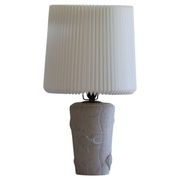 Modern vintage French table lamp, made of stone with fish patterns, 1970s.