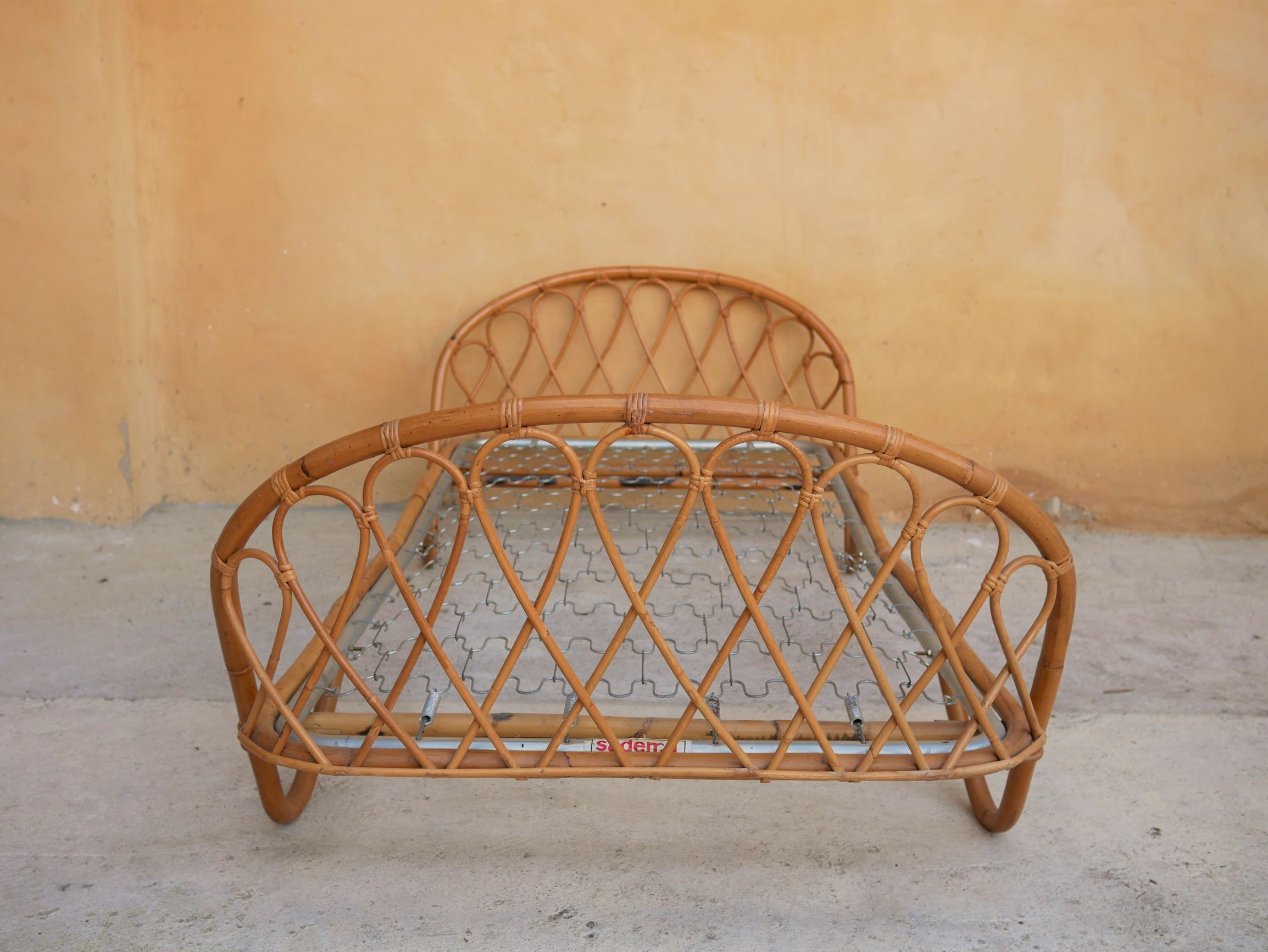 Vintage rattan bed