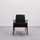 Henryk Lis armchair in black boucle 1960