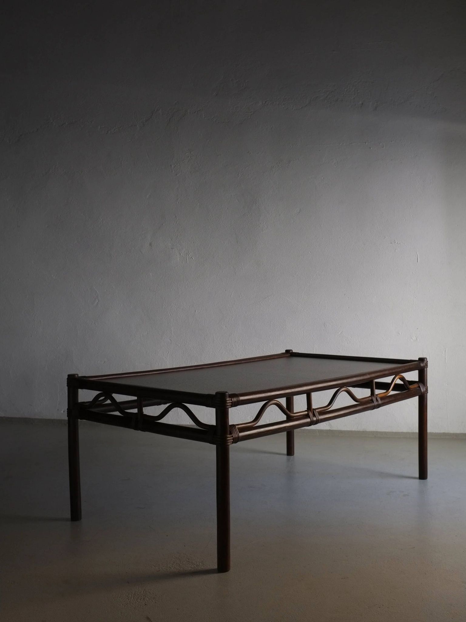 Dark rattan glass coffee table | 1980s