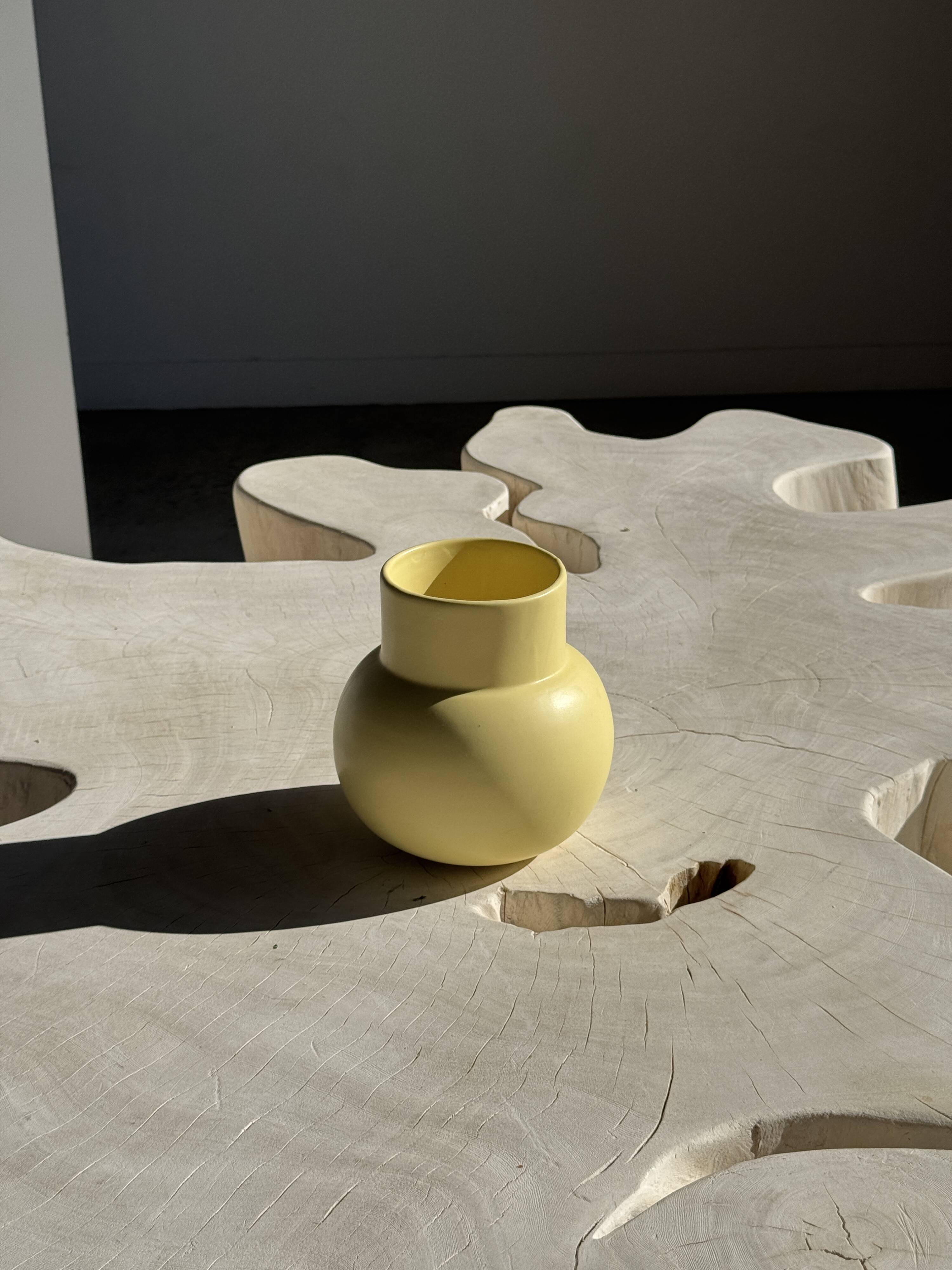 Small light yellow ball vase