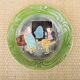 Old slipware plate: couple of peasants