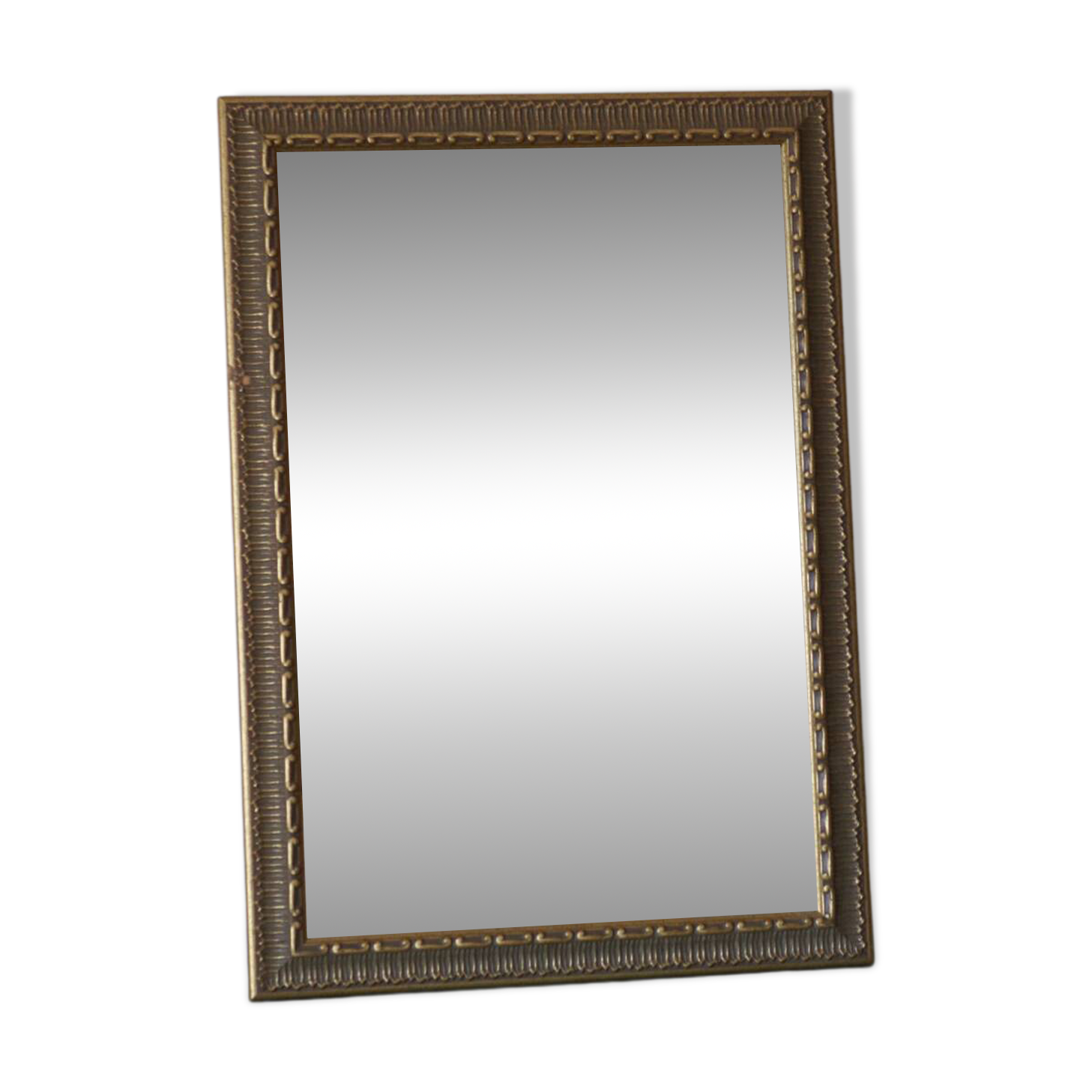 Rectangular gold mirror with moulded decoration.