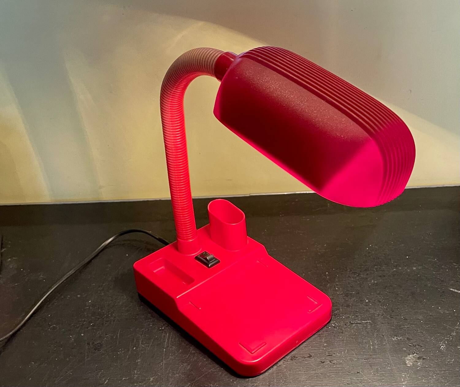 Vintage red articulated desk lamp