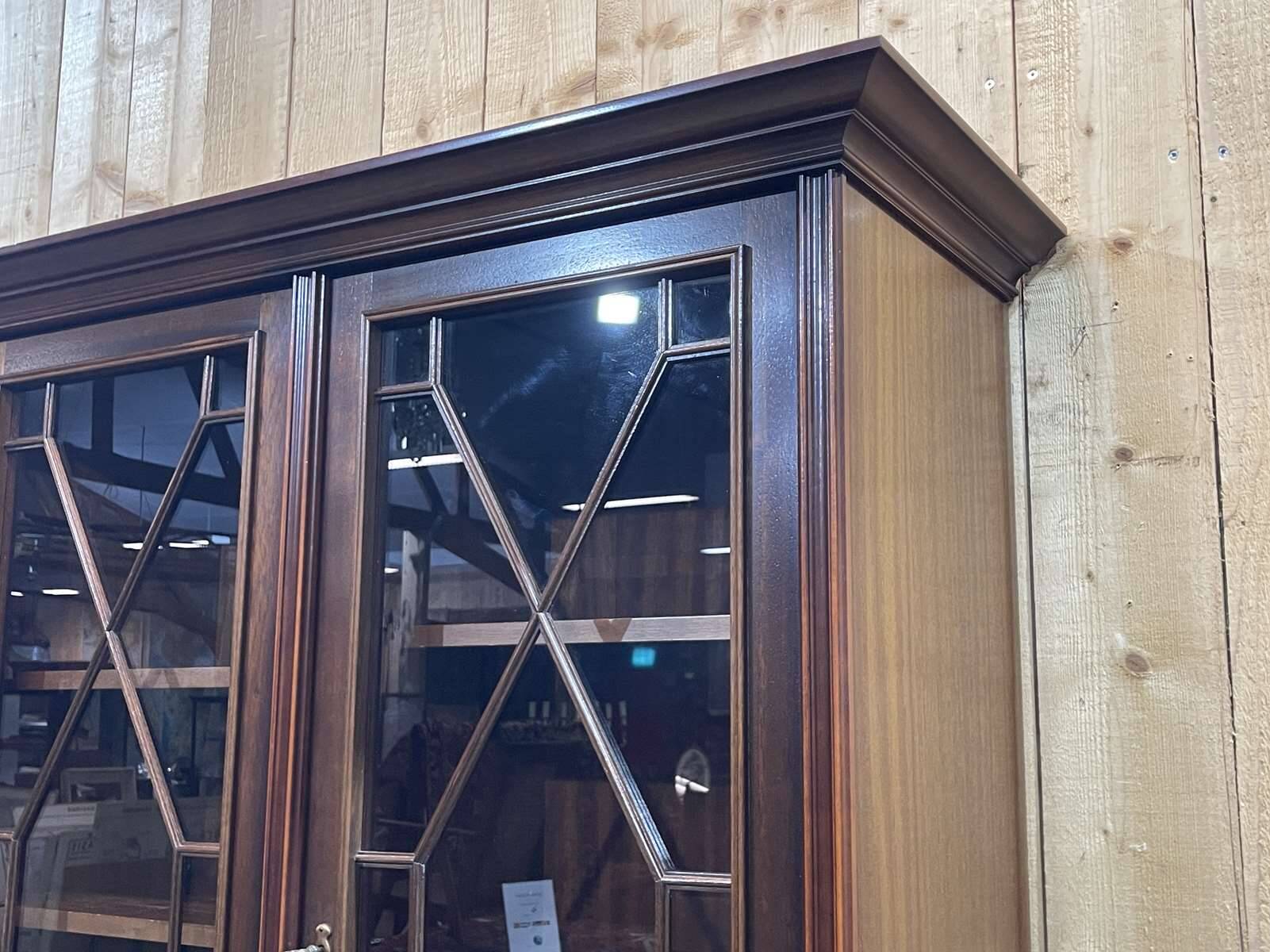 English two-piece mahogany bookcase, made in the 1970s