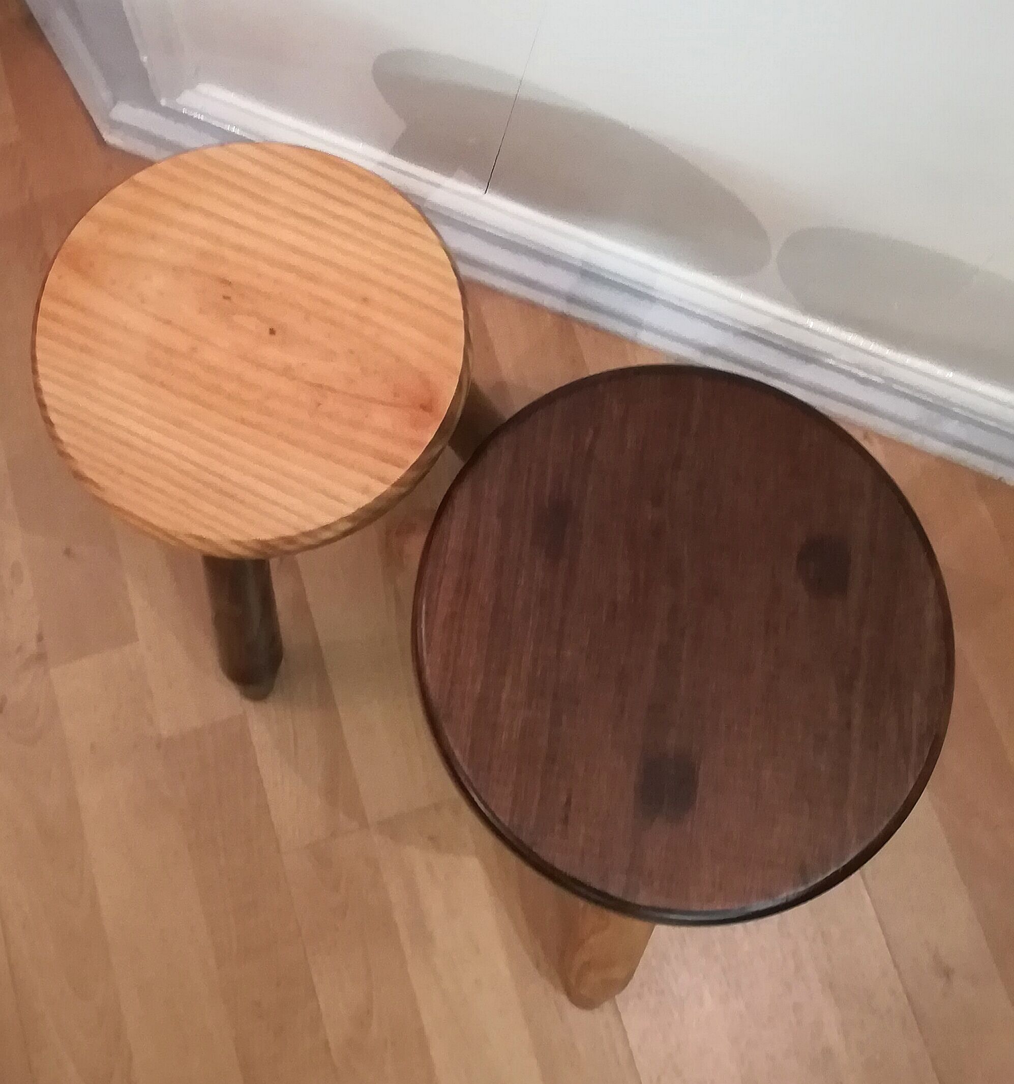 Two tripod stools wooden feet pencils