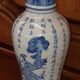 Ancient Chinese vase with blue decoration of sage and inscriptions