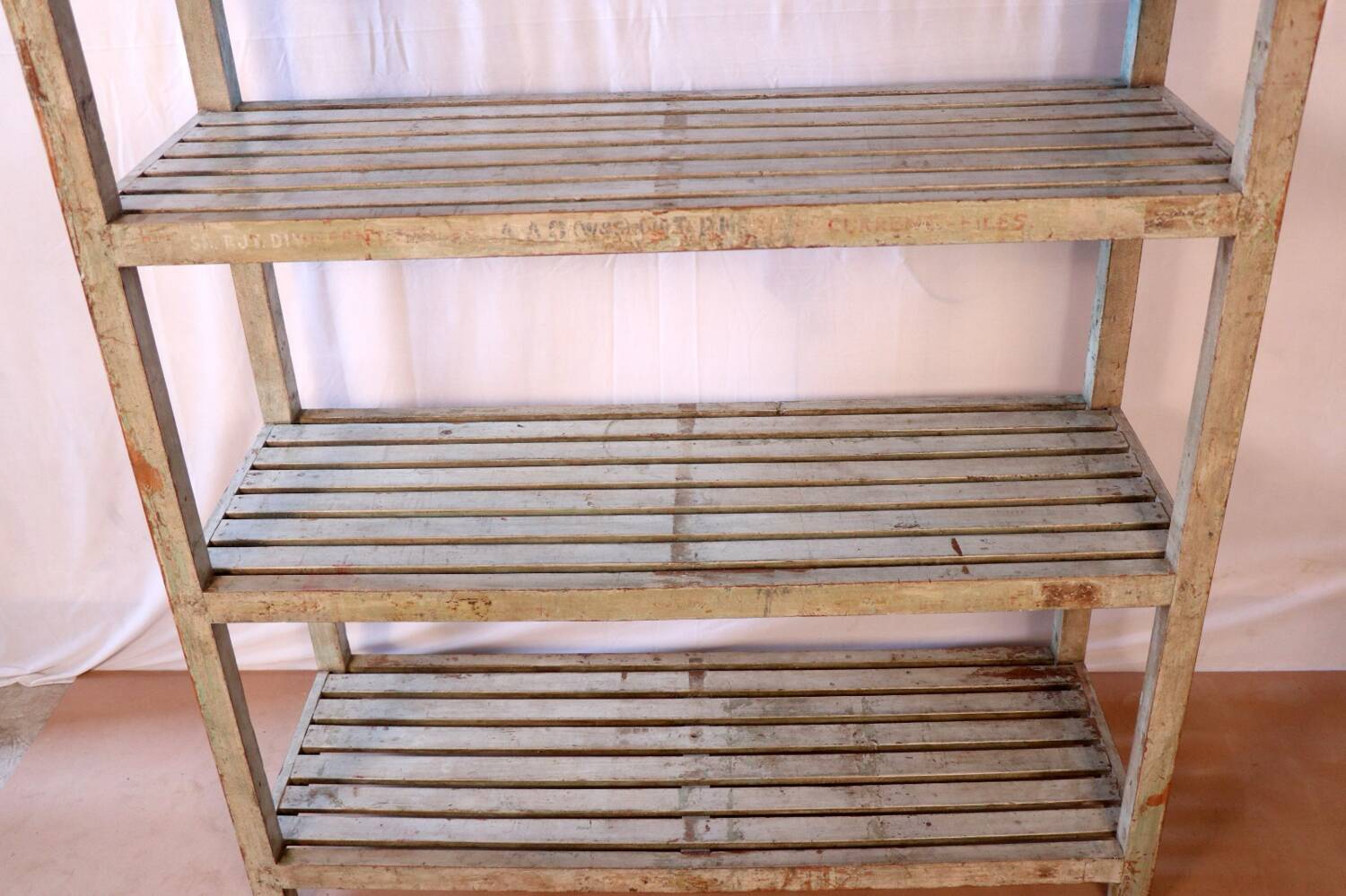 Teak bookshelf with original off-white patina.