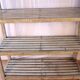 Teak bookshelf with original off-white patina.