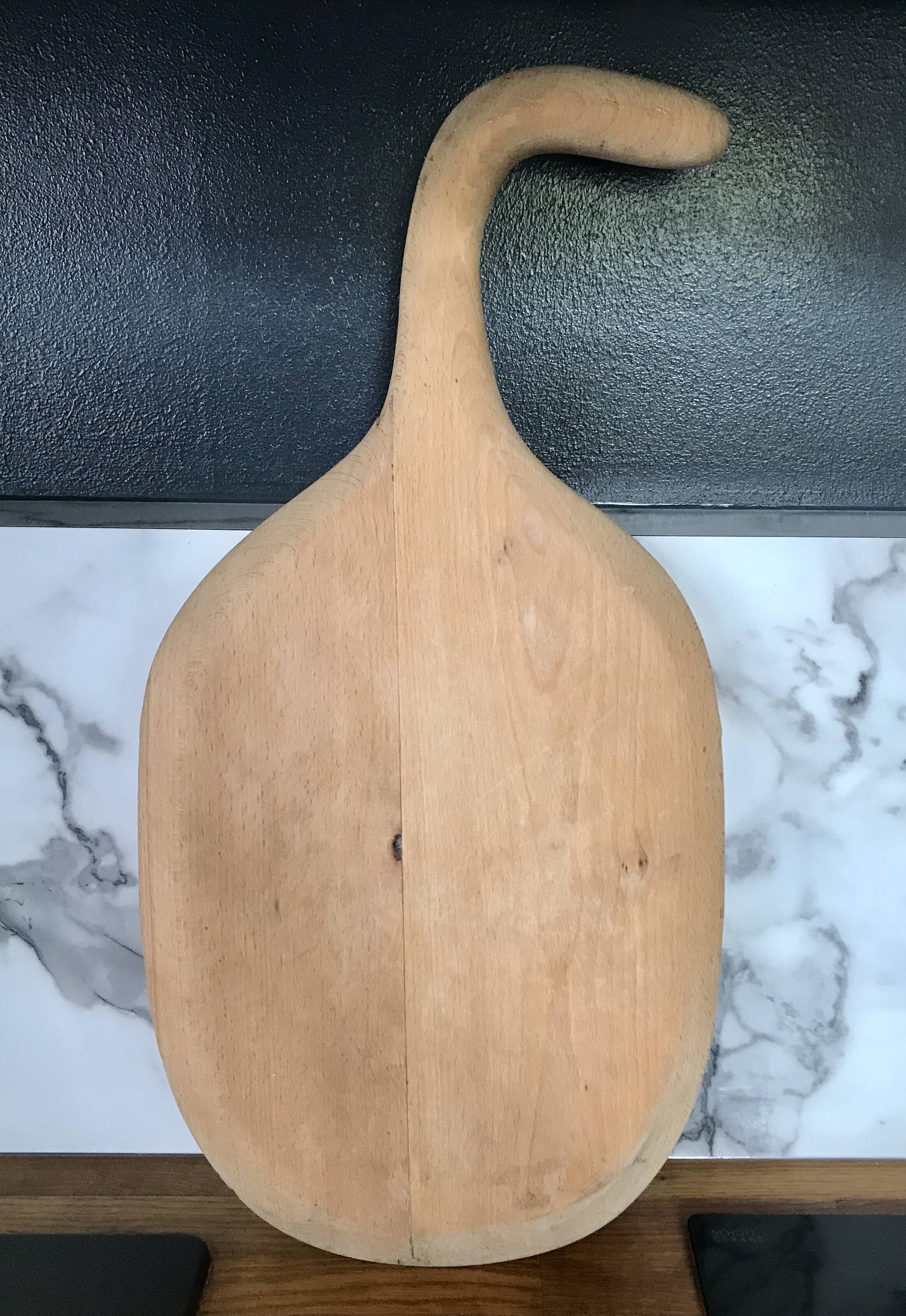 Vintage cutting board with swan neck handle