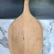 Vintage cutting board with swan neck handle