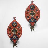 Pair of folk art sheet metal wall lamps, 1950s.