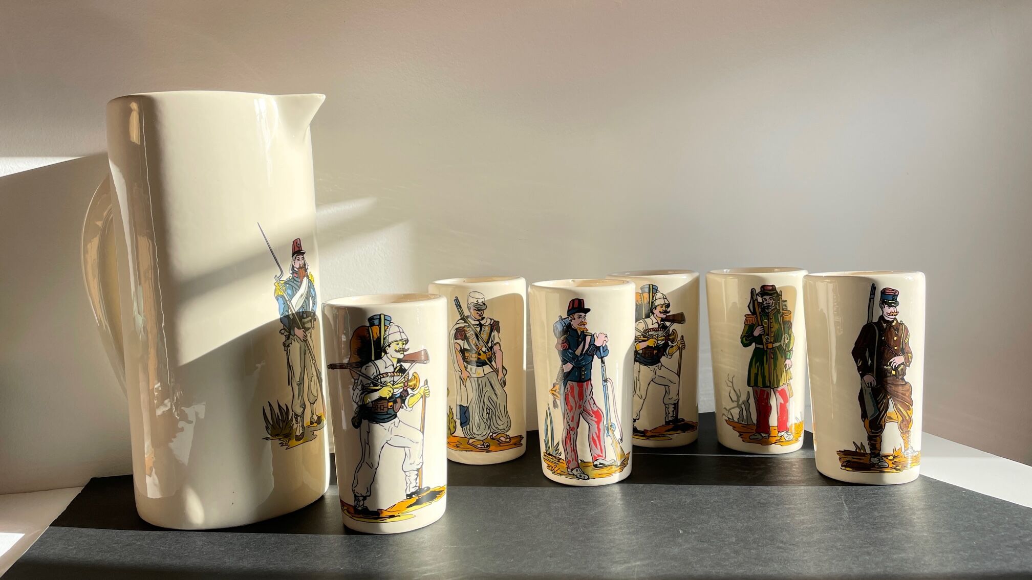 Orangeade service to vintage ceramic soldiers