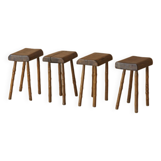 Set of 4 handcrafted brutalist stools in solid wood circa 1960