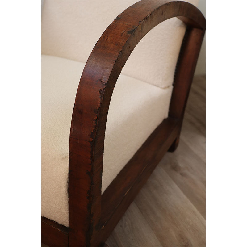 Pair of modernist armchairs in wood and buckle fabric, 1940