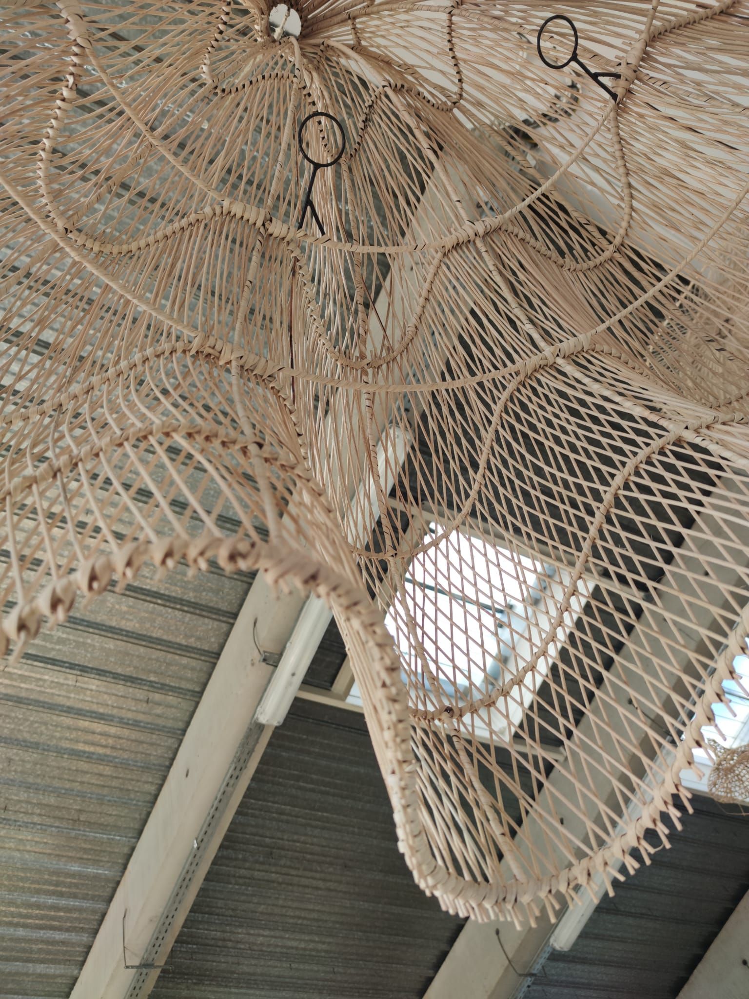 Huge rattan suspension in the shape of a corolla H:1m; D: 1m50