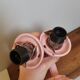 Set of 2 vintage pastel pink enamelled cast iron wall lamps