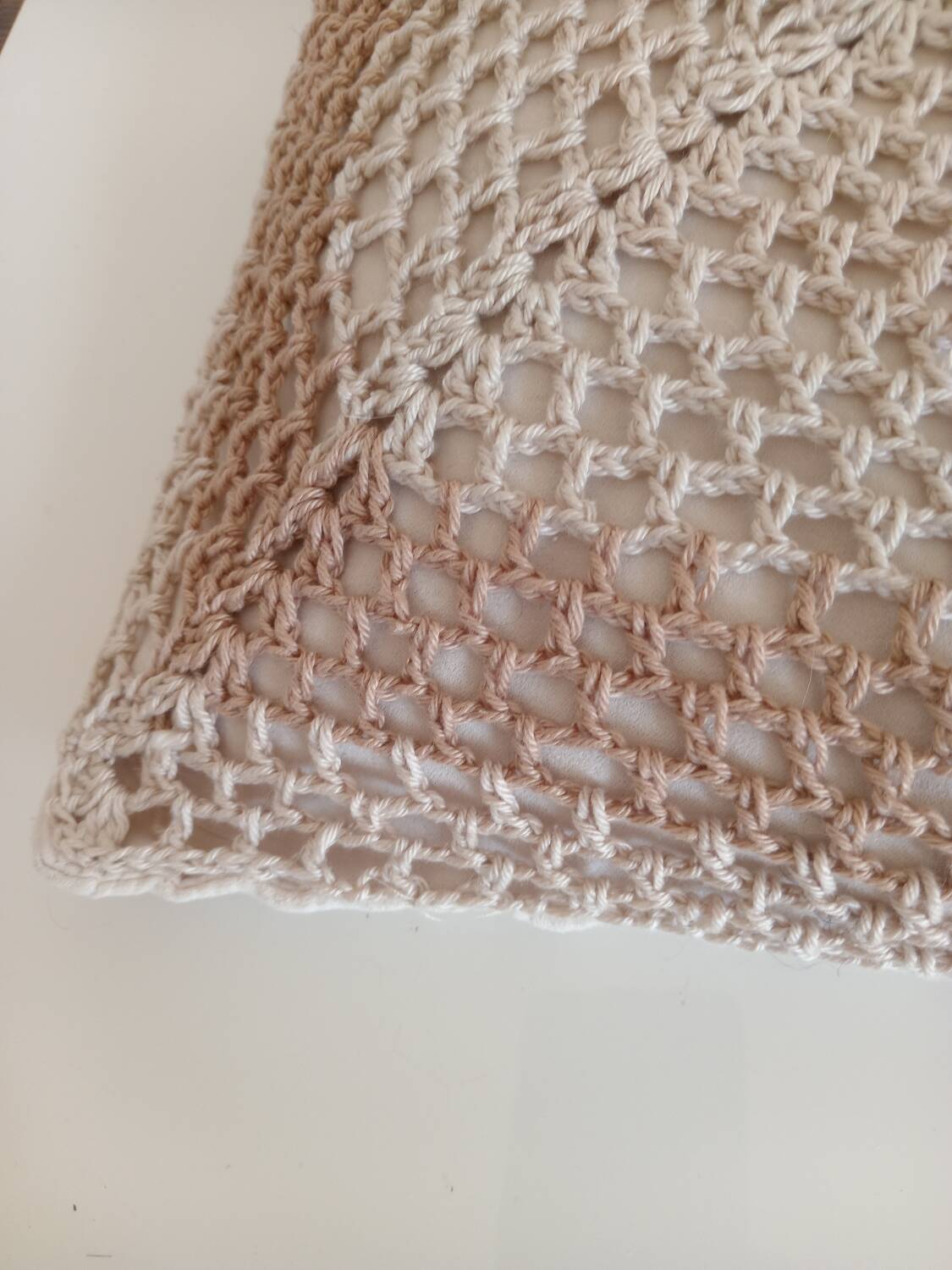 Pair of crocheted cushions