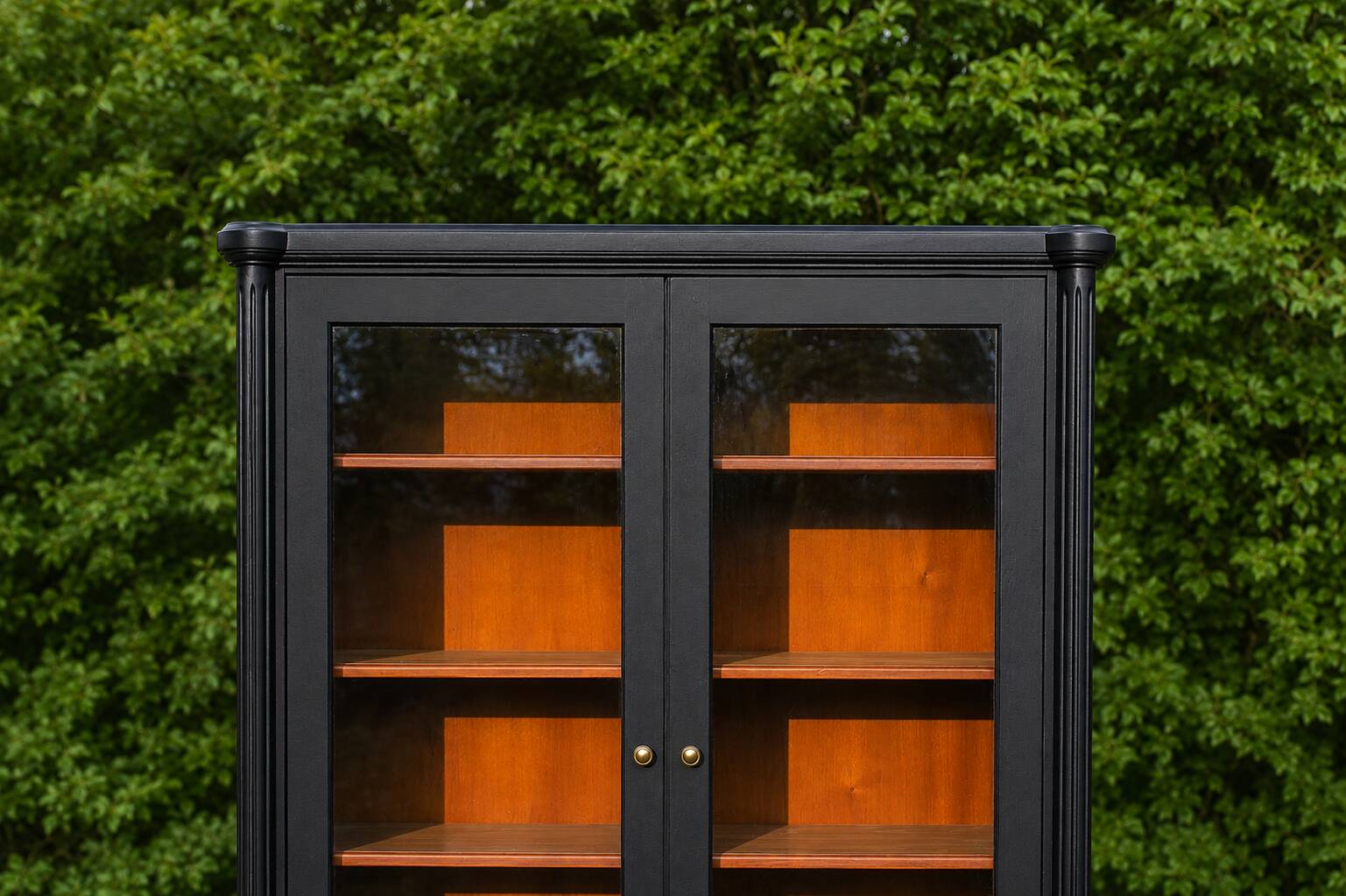 Renovated black antique Louis XVI style display cabinet, glass-fronted bookcase.