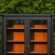 Renovated black antique Louis XVI style display cabinet, glass-fronted bookcase.