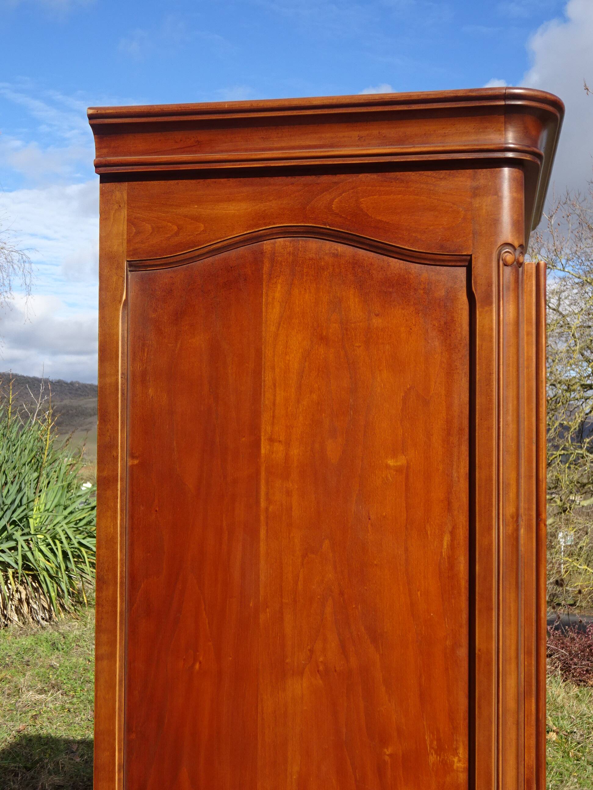 Louis XV style bonnetière in solid cherry wood
