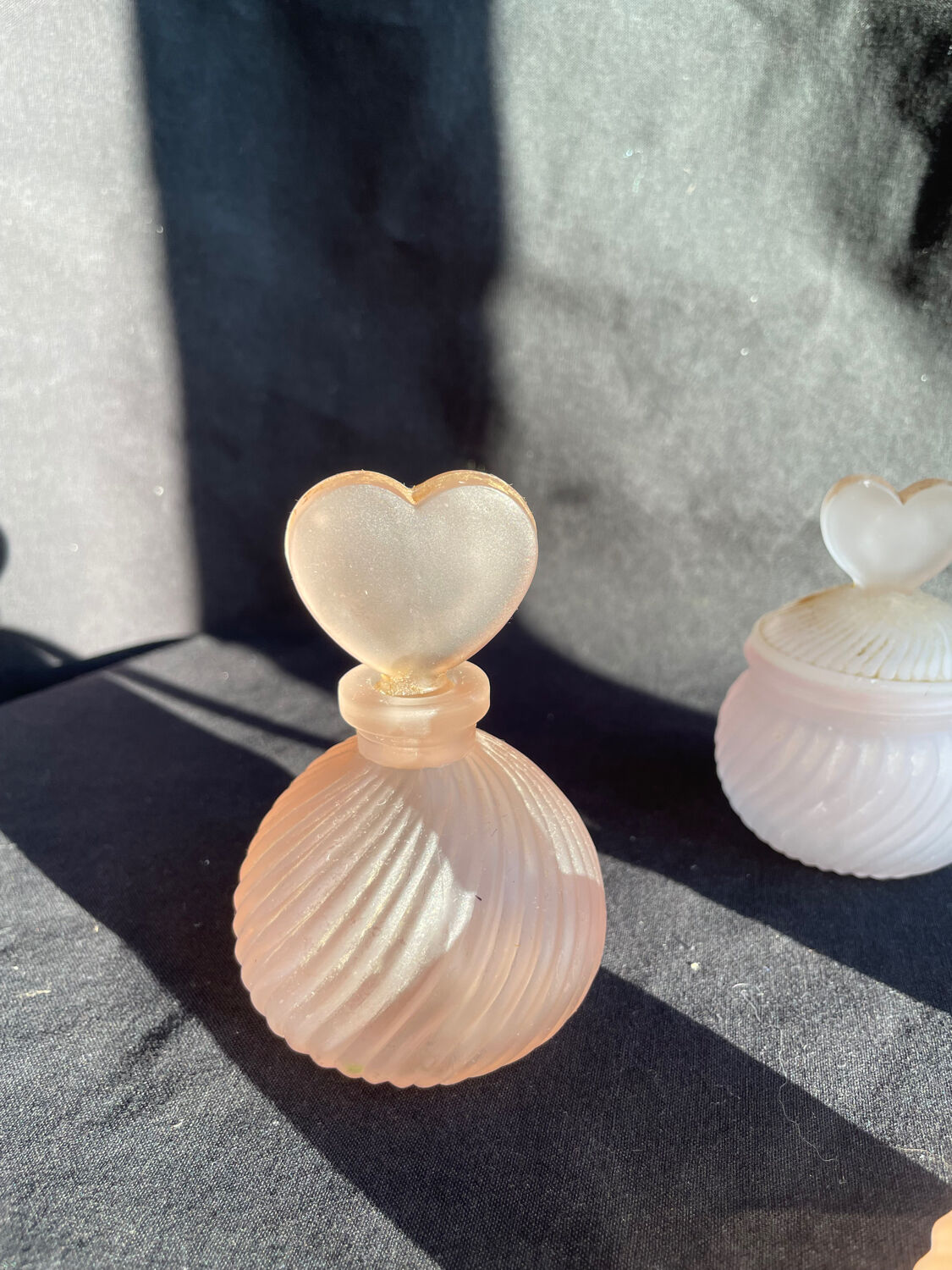 Set of vintage glass pink perfume bathroom jars