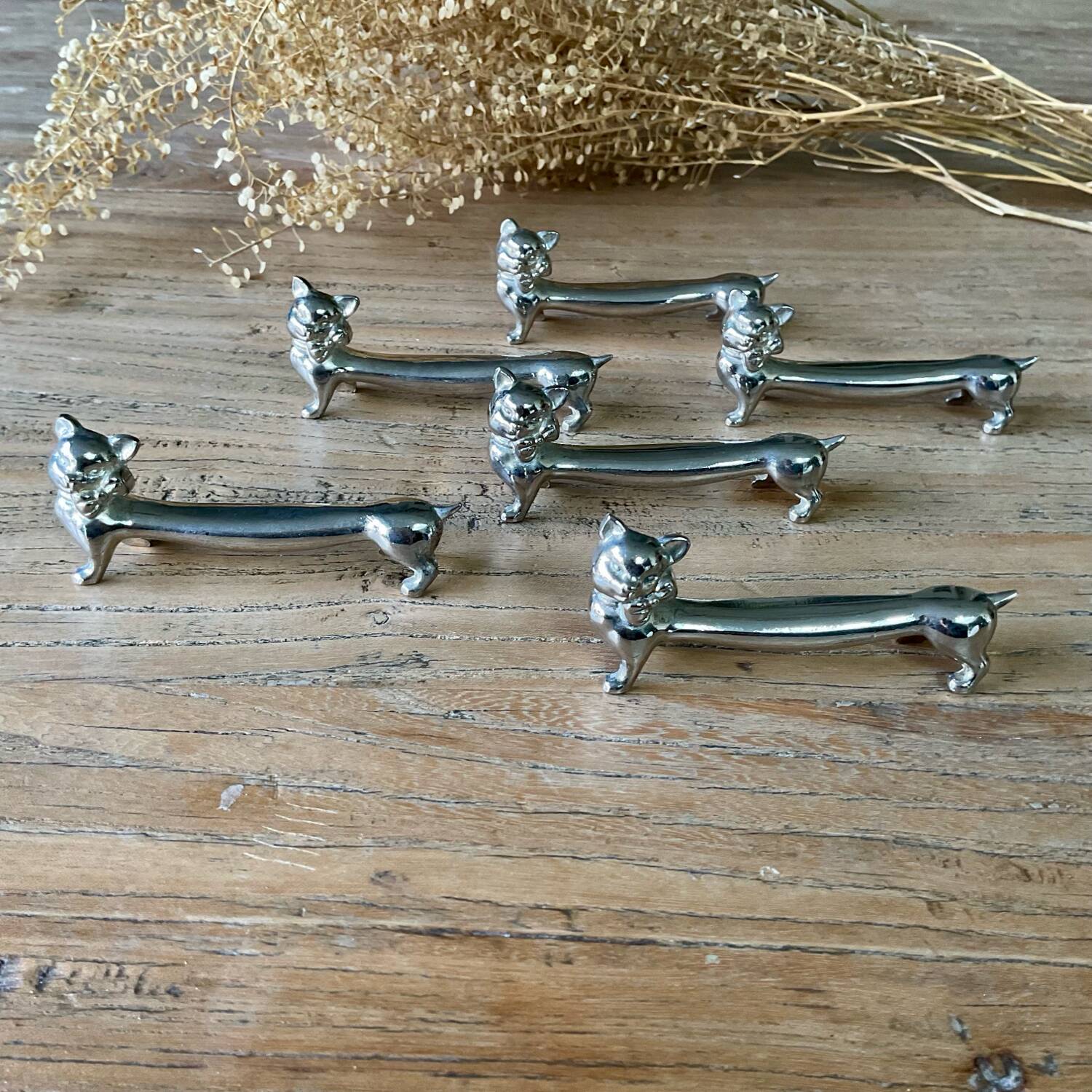 6 silver metal “cat” knife holders