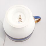 Antique Wedgwood teacup and saucer, bone china. Powder blue and gold English footed cup and saucer,