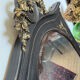 Large old trumeau mirror in black and gilded wood Napoleon style