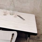 Table and 2 chairs set made of Formica.