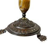 Vintage gold floor lamp with fringed shade.