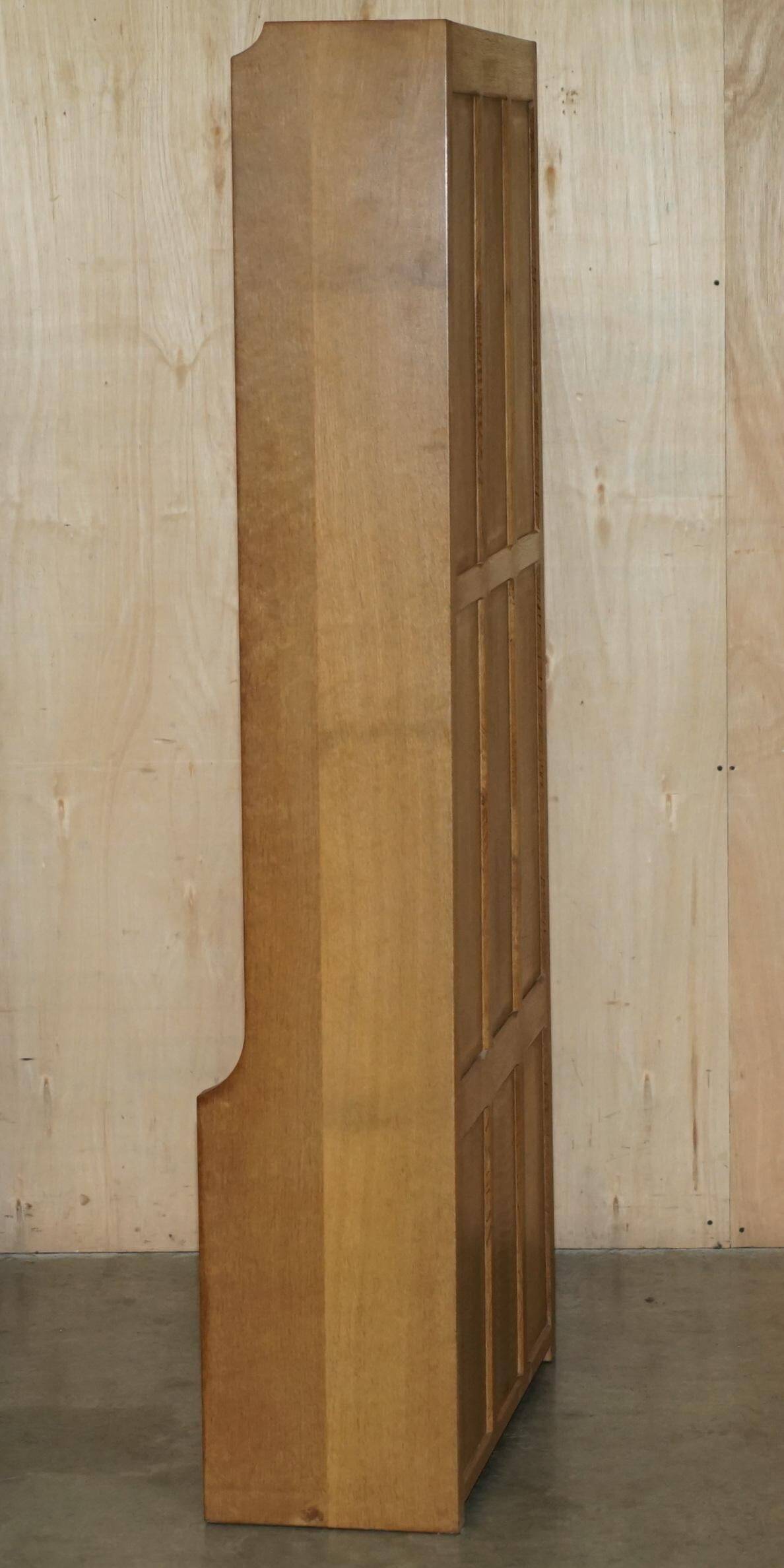 Pair of Robert Mouseman Thompson oak carved bookshelves.